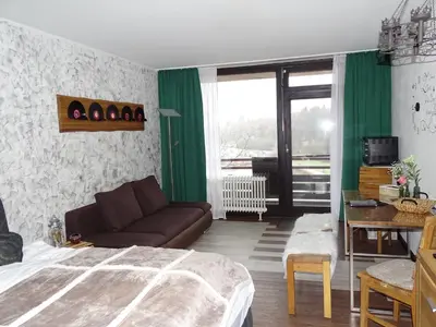 Ein Sitzbereich in der Unterkunft Sweet Harmony Apartment mit Seeblick zum Genießen