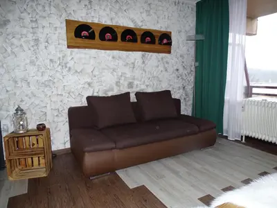 Ein Sitzbereich in der Unterkunft Sweet Harmony Apartment mit Seeblick zum Genießen