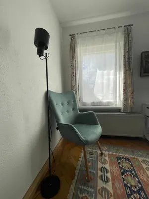 Ein Sitzbereich in der Unterkunft Ferienwohnung für 2 Gäste