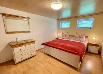 Ein Bett oder Betten in einem Zimmer der Unterkunft Ferienhaus Kurt