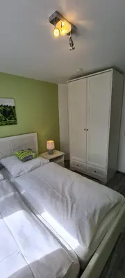 Ein Bett oder Betten in einem Zimmer der Unterkunft Ferienwohnung Nr 12 inkl Bettwäsche Handtücher Endreinigung