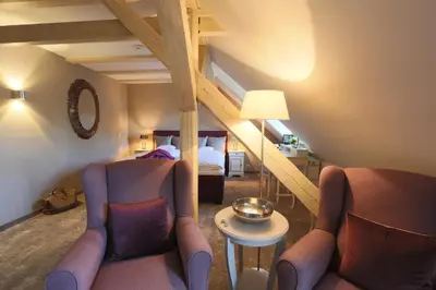 Ein Sitzbereich in der Unterkunft Romantik Hotel am Brühl