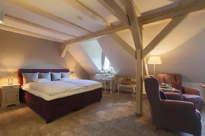 Ein Bett oder Betten in einem Zimmer der Unterkunft Romantik Hotel am Brühl