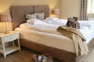 Ein Bett oder Betten in einem Zimmer der Unterkunft Romantik Hotel am Brühl