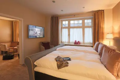 Ein Bett oder Betten in einem Zimmer der Unterkunft Romantik Hotel am Brühl