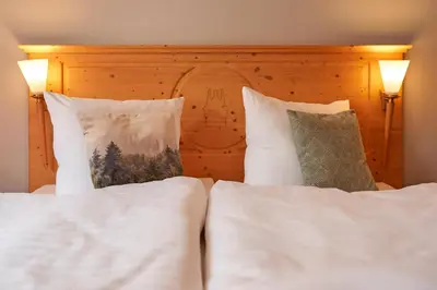 Ein Bett oder Betten in einem Zimmer der Unterkunft Hotel Schlossblick
