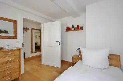 Ein Bett oder Betten in einem Zimmer der Unterkunft Ferienwohnung im Marktkirchhof
