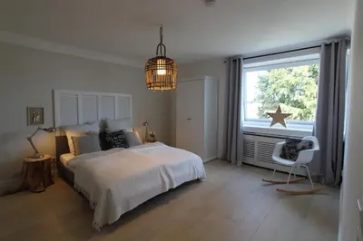 Ein Bett oder Betten in einem Zimmer der Unterkunft Ferienwohnung Wiesengrund