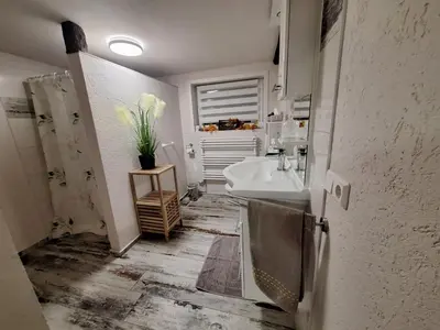 Ein Badezimmer in der Unterkunft FeWo Am alten Holzplatz
