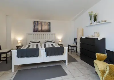 Ein Bett oder Betten in einem Zimmer der Unterkunft Harz Living