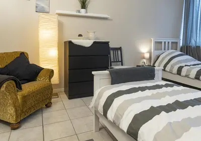 Ein Bett oder Betten in einem Zimmer der Unterkunft Harz Living