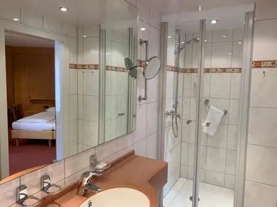 Ein Badezimmer in der Unterkunft Hotel Haus am Hochwald