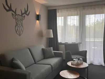 Ein Sitzbereich in der Unterkunft Hotel Haus am Hochwald
