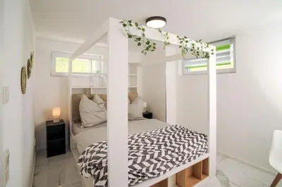 Ein Bett oder Betten in einem Zimmer der Unterkunft Designapartments Business and More - Sennhütte 9
