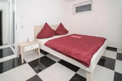 Ein Bett oder Betten in einem Zimmer der Unterkunft Designpension Classicidyll - Sennhütte 3