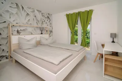 Ein Bett oder Betten in einem Zimmer der Unterkunft Designloft SH 19 - Upgrade House