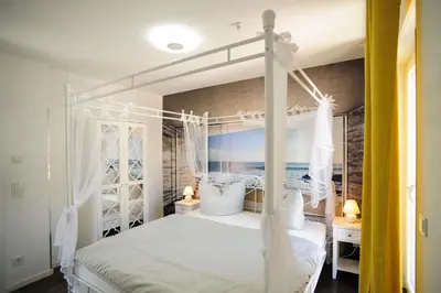 Ein Bett oder Betten in einem Zimmer der Unterkunft Designpension Idyll Nr21 Hotel Garni