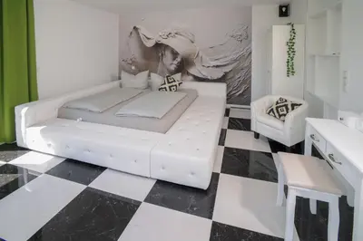 Ein Bett oder Betten in einem Zimmer der Unterkunft Designlofts Über der Stadt - Sennhütte 15