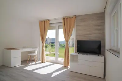 TV/Unterhaltungsangebot in der Unterkunft Designapartments Die besondere ART - Sennhütte 7