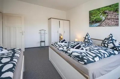 Ein Bett oder Betten in einem Zimmer der Unterkunft Appartement am Westerntor II