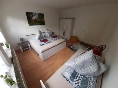 Ein Bett oder Betten in einem Zimmer der Unterkunft Appartement am Westerntor II