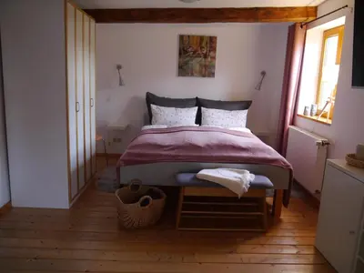 Ein Bett oder Betten in einem Zimmer der Unterkunft 
