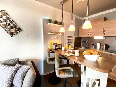Ein Sitzbereich in der Unterkunft RelaxApartments ABENDSONNE im Herzen des Harzes - ein El Dorado für Wanderer, Biker und Ruhesuchende - mit sonnigem Balkon und Platz für bis zu 3 Personen