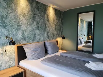 Ein Bett oder Betten in einem Zimmer der Unterkunft Harz Style - Vier Jahreszeiten