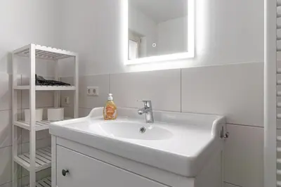 Ein Badezimmer in der Unterkunft Ferienwohnungen Galerie im Klink