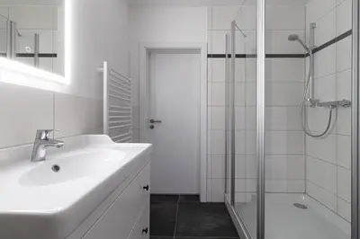 Ein Badezimmer in der Unterkunft Ferienwohnungen Galerie im Klink