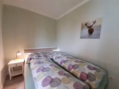 Ein Bett oder Betten in einem Zimmer der Unterkunft BocksbergGlück in Hahnenklee, Endreinigung, bezogene Betten, Handtücher inklusive