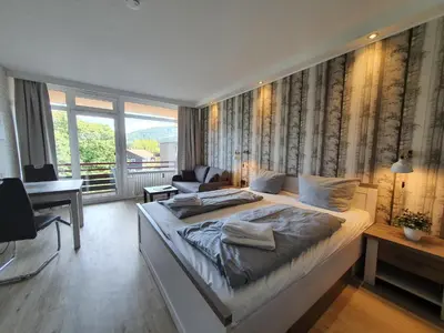 Ein Bett oder Betten in einem Zimmer der Unterkunft Harz Relax - Vier Jahreszeiten
