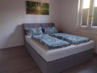 Ein Bett oder Betten in einem Zimmer der Unterkunft Insel