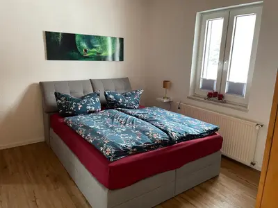 Ein Bett oder Betten in einem Zimmer der Unterkunft Insel