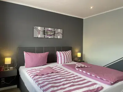 Ein Bett oder Betten in einem Zimmer der Unterkunft Ferienhaus BellaVita