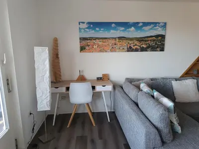 Ein Sitzbereich in der Unterkunft Ferienwohnung Harz Valley -Mit Fernblick in den Harz.