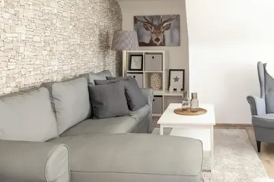 Ein Sitzbereich in der Unterkunft Appartements am Eck