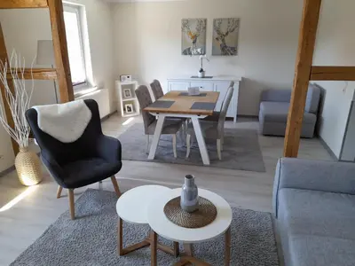 Ein Sitzbereich in der Unterkunft Appartements am Eck