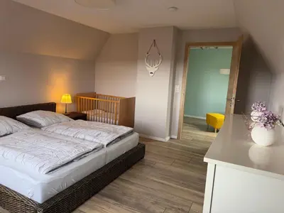 Ein Bett oder Betten in einem Zimmer der Unterkunft Harzhaus Ida