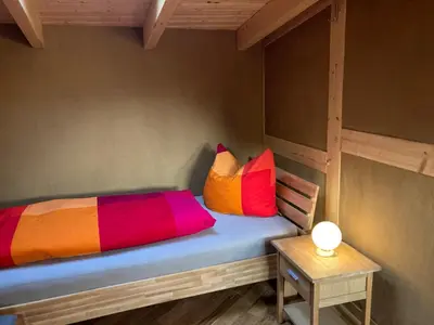 Ein Bett oder Betten in einem Zimmer der Unterkunft Münzenberg 42