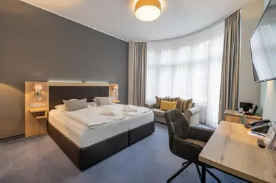 Ein Bett oder Betten in einem Zimmer der Unterkunft Göbel´s Vital Hotel Bad Sachsa