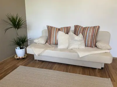 Ein Sitzbereich in der Unterkunft Ferienwohnung Bergblick