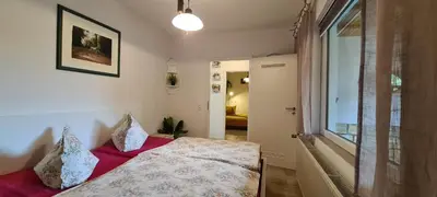 Ein Bett oder Betten in einem Zimmer der Unterkunft Auf dem Reiterhof