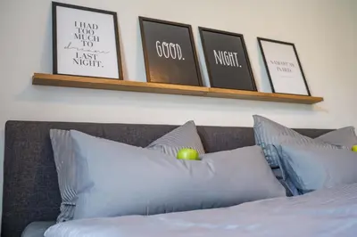 Ein Bett oder Betten in einem Zimmer der Unterkunft 4 Sterne Ferienwohnung , 65 qm