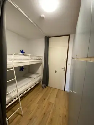 Ein Bett oder Betten in einem Zimmer der Unterkunft Hans im Glück