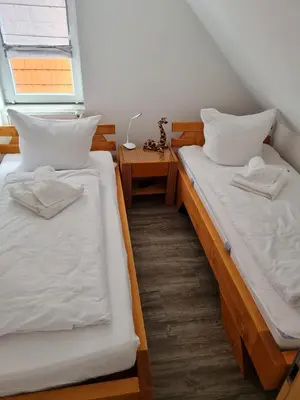 Ein Bett oder Betten in einem Zimmer der Unterkunft Ferienwohnung Holti