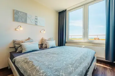 Ein Bett oder Betten in einem Zimmer der Unterkunft Penthouse Harz-Traum 372