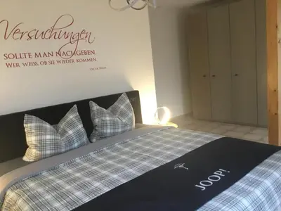 Ein Bett oder Betten in einem Zimmer der Unterkunft Atelier Wolkenschloss