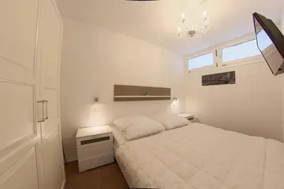 Ein Bett oder Betten in einem Zimmer der Unterkunft Apartment 444