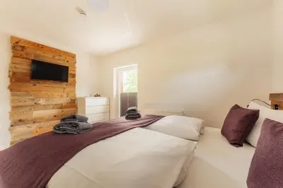 Ein Bett oder Betten in einem Zimmer der Unterkunft Reitstieg